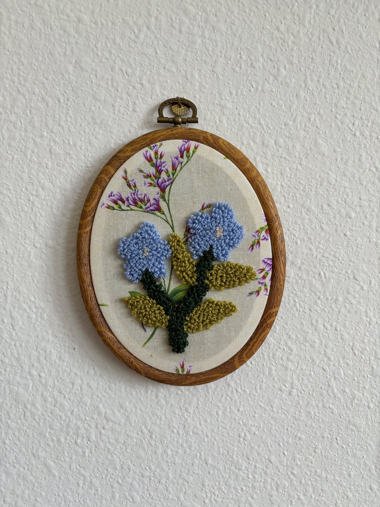 Forget me not on Purple Flowers