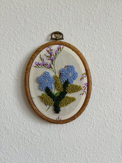 Forget me not on Purple Flowers