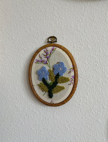 Forget me not on Purple Flowers