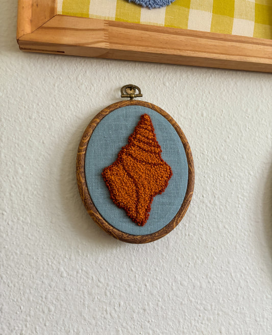 Horse Conch Seashell on Blue