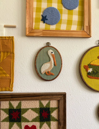 Pelican on Green Plaid