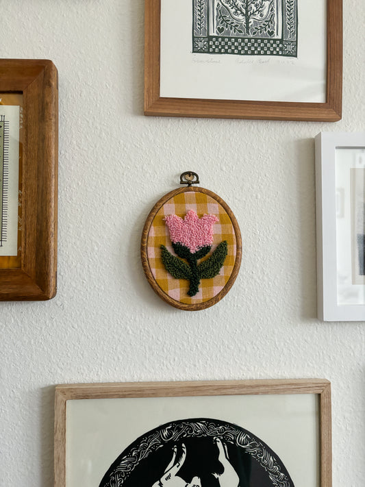 Pink Tulip on Checkered Background