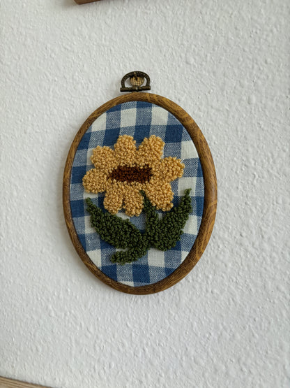 Sunflower on Blue Checkered Fabric